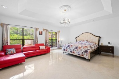 Exceptional 6BR/3-2hb stunning residence nestled on a corner lot on TPC Eagle Trace in Florida - for sale on GolfHomes.com, golf home, golf lot