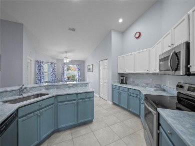 Beautifully Updated Home in the Desirable W Section of Pine on The Grand Club - Pine Lakes Course in Florida - for sale on GolfHomes.com, golf home, golf lot