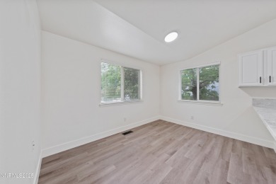 Nestled in the sought-after Sunridge community, this beautifully on Sun Ridge Golf Course in Nevada - for sale on GolfHomes.com, golf home, golf lot