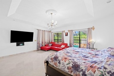 Exceptional 6BR/3-2hb stunning residence nestled on a corner lot on TPC Eagle Trace in Florida - for sale on GolfHomes.com, golf home, golf lot