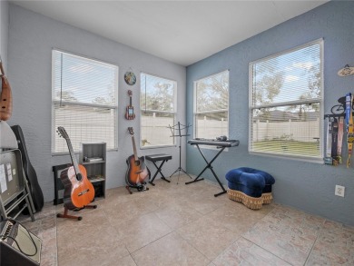 Beautifully Updated Home in the Desirable W Section of Pine on The Grand Club - Pine Lakes Course in Florida - for sale on GolfHomes.com, golf home, golf lot
