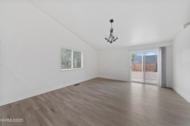 Nestled in the sought-after Sunridge community, this beautifully on Sun Ridge Golf Course in Nevada - for sale on GolfHomes.com, golf home, golf lot
