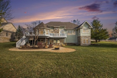 Discover the pinnacle of elegance and tranquility with this on Tullymore Golf Club in Michigan - for sale on GolfHomes.com, golf home, golf lot