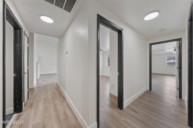 Nestled in the sought-after Sunridge community, this beautifully on Sun Ridge Golf Course in Nevada - for sale on GolfHomes.com, golf home, golf lot