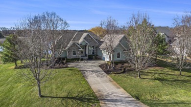 Discover the pinnacle of elegance and tranquility with this on Tullymore Golf Club in Michigan - for sale on GolfHomes.com, golf home, golf lot