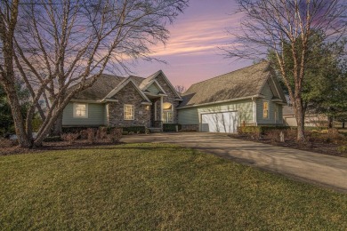 Discover the pinnacle of elegance and tranquility with this on Tullymore Golf Club in Michigan - for sale on GolfHomes.com, golf home, golf lot