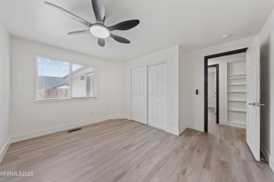 Nestled in the sought-after Sunridge community, this beautifully on Sun Ridge Golf Course in Nevada - for sale on GolfHomes.com, golf home, golf lot