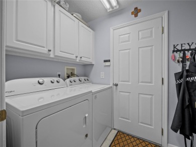 Beautifully Updated Home in the Desirable W Section of Pine on The Grand Club - Pine Lakes Course in Florida - for sale on GolfHomes.com, golf home, golf lot