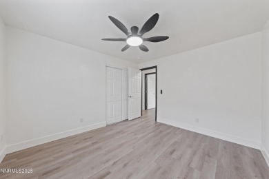 Nestled in the sought-after Sunridge community, this beautifully on Sun Ridge Golf Course in Nevada - for sale on GolfHomes.com, golf home, golf lot