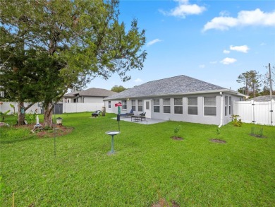 Beautifully Updated Home in the Desirable W Section of Pine on The Grand Club - Pine Lakes Course in Florida - for sale on GolfHomes.com, golf home, golf lot