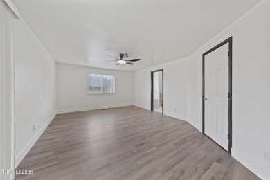 Nestled in the sought-after Sunridge community, this beautifully on Sun Ridge Golf Course in Nevada - for sale on GolfHomes.com, golf home, golf lot