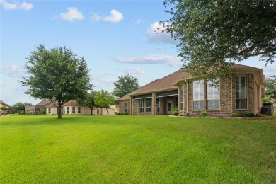 Welcome to your dream home in the prestigious Harbor Lakes on Harbor Lakes Golf Club in Texas - for sale on GolfHomes.com, golf home, golf lot
