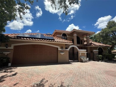 Exceptional 6BR/3-2hb stunning residence nestled on a corner lot on TPC Eagle Trace in Florida - for sale on GolfHomes.com, golf home, golf lot