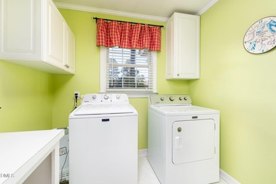 Prime GOLF COURSE Location! Welcome to a home that instantly on Henderson Country Club in North Carolina - for sale on GolfHomes.com, golf home, golf lot