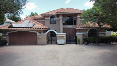 Exceptional 6BR/3-2hb stunning residence nestled on a corner lot on TPC Eagle Trace in Florida - for sale on GolfHomes.com, golf home, golf lot
