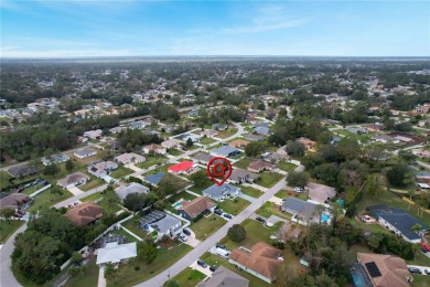 Beautifully Updated Home in the Desirable W Section of Pine on The Grand Club - Pine Lakes Course in Florida - for sale on GolfHomes.com, golf home, golf lot