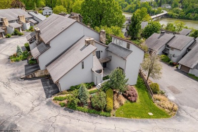 Welcome to this 2 bed, 3.5 bath contemporary end-unit townhome on Lakeview Golf Resort and Spa - Lakeview in West Virginia - for sale on GolfHomes.com, golf home, golf lot