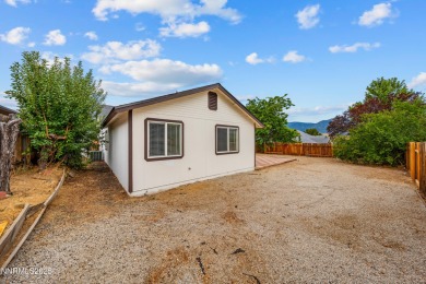 Nestled in the sought-after Sunridge community, this beautifully on Sun Ridge Golf Course in Nevada - for sale on GolfHomes.com, golf home, golf lot