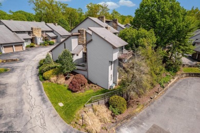 Welcome to this 2 bed, 3.5 bath contemporary end-unit townhome on Lakeview Golf Resort and Spa - Lakeview in West Virginia - for sale on GolfHomes.com, golf home, golf lot