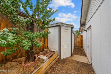 Nestled in the sought-after Sunridge community, this beautifully on Sun Ridge Golf Course in Nevada - for sale on GolfHomes.com, golf home, golf lot