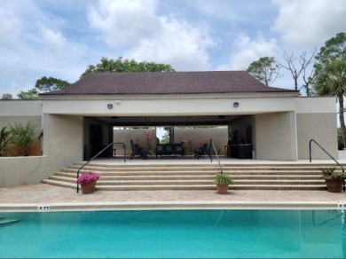 Beautifully Updated Home in the Desirable W Section of Pine on The Grand Club - Pine Lakes Course in Florida - for sale on GolfHomes.com, golf home, golf lot