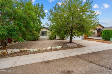Nestled in the sought-after Sunridge community, this beautifully on Sun Ridge Golf Course in Nevada - for sale on GolfHomes.com, golf home, golf lot