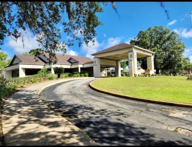 Beautifully Updated Home in the Desirable W Section of Pine on The Grand Club - Pine Lakes Course in Florida - for sale on GolfHomes.com, golf home, golf lot