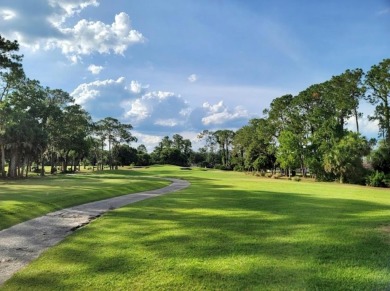 Beautifully Updated Home in the Desirable W Section of Pine on The Grand Club - Pine Lakes Course in Florida - for sale on GolfHomes.com, golf home, golf lot
