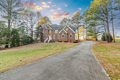 Prime GOLF COURSE Location! Welcome to a home that instantly on Henderson Country Club in North Carolina - for sale on GolfHomes.com, golf home, golf lot
