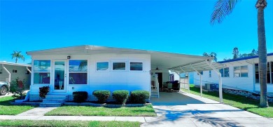 Welcome to this beautifully updated 2-bedroom, 2-bath home on Fairway Village Golf Course in Florida - for sale on GolfHomes.com, golf home, golf lot