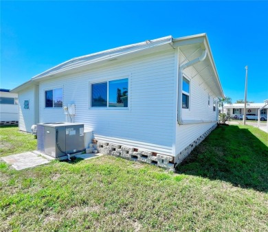 Welcome to this beautifully updated 2-bedroom, 2-bath home on Fairway Village Golf Course in Florida - for sale on GolfHomes.com, golf home, golf lot