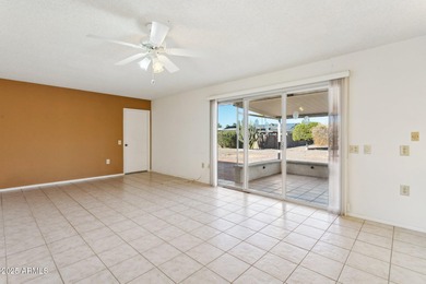 This Sun City home has 3 bedrooms and 2 updated bathrooms on Sun City Lakes West and East in Arizona - for sale on GolfHomes.com, golf home, golf lot