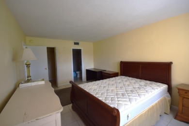 Enjoy serene golf course views and resort-style amenities in on Oriole Golf and Tennis Club in Florida - for sale on GolfHomes.com, golf home, golf lot