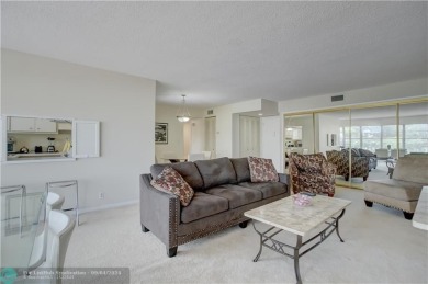 LIVE THE LIFESTYLE IN COUNTRY CLUB TOWERS! THIS UNIT EXTRA CLEAN on Coral Ridge Country Club in Florida - for sale on GolfHomes.com, golf home, golf lot