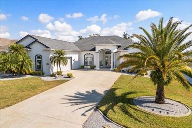 Stunning EXECUTIVE  HOME on a premium lot with SERENE GOLF on Huntington Hills Golf and Country Club in Florida - for sale on GolfHomes.com, golf home, golf lot