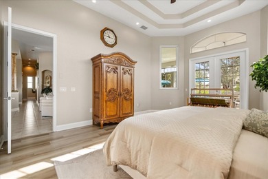 Stunning EXECUTIVE  HOME on a premium lot with SERENE GOLF on Huntington Hills Golf and Country Club in Florida - for sale on GolfHomes.com, golf home, golf lot