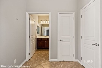 This quaint town home is gorgeous and ideally positioned in on Wolf Creek At Paradise Canyon in Nevada - for sale on GolfHomes.com, golf home, golf lot