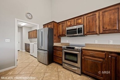 This quaint town home is gorgeous and ideally positioned in on Wolf Creek At Paradise Canyon in Nevada - for sale on GolfHomes.com, golf home, golf lot