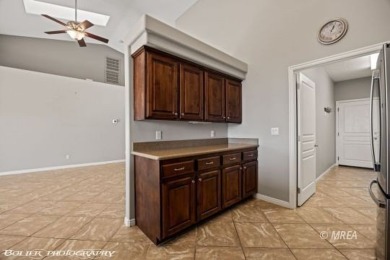 This quaint town home is gorgeous and ideally positioned in on Wolf Creek At Paradise Canyon in Nevada - for sale on GolfHomes.com, golf home, golf lot