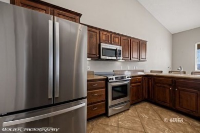 This quaint town home is gorgeous and ideally positioned in on Wolf Creek At Paradise Canyon in Nevada - for sale on GolfHomes.com, golf home, golf lot