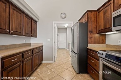 This quaint town home is gorgeous and ideally positioned in on Wolf Creek At Paradise Canyon in Nevada - for sale on GolfHomes.com, golf home, golf lot