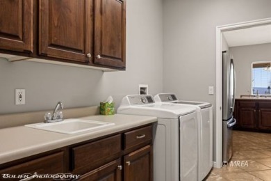 This quaint town home is gorgeous and ideally positioned in on Wolf Creek At Paradise Canyon in Nevada - for sale on GolfHomes.com, golf home, golf lot