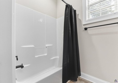 This spacious 4-bedroom, 2.5 bath residence features 2,222 on The Club River Forest in Georgia - for sale on GolfHomes.com, golf home, golf lot