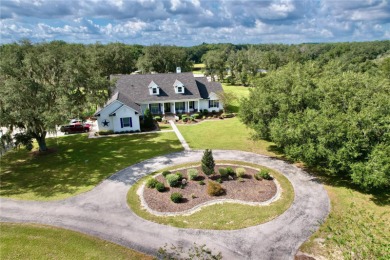 Under contract-accepting backup offers. This Spectacular Custom on Lake Jovita Golf and Country Club in Florida - for sale on GolfHomes.com, golf home, golf lot