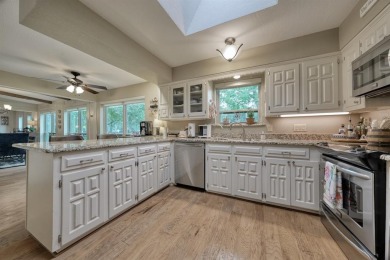 Nestled directly on the scenic Golf Course in Hideaway, this on Hide-A-Way Lake Golf Course in Texas - for sale on GolfHomes.com, golf home, golf lot