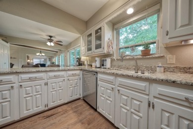 Nestled directly on the scenic Golf Course in Hideaway, this on Hide-A-Way Lake Golf Course in Texas - for sale on GolfHomes.com, golf home, golf lot