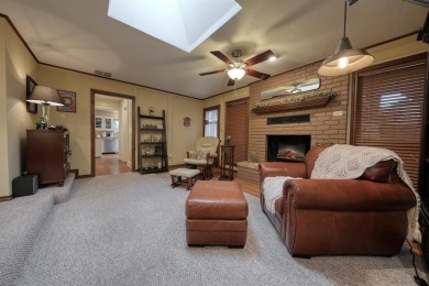 Nestled directly on the scenic Golf Course in Hideaway, this on Hide-A-Way Lake Golf Course in Texas - for sale on GolfHomes.com, golf home, golf lot