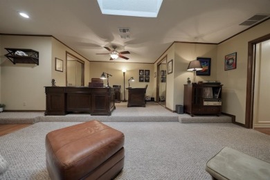 Nestled directly on the scenic Golf Course in Hideaway, this on Hide-A-Way Lake Golf Course in Texas - for sale on GolfHomes.com, golf home, golf lot