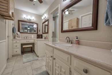 Nestled directly on the scenic Golf Course in Hideaway, this on Hide-A-Way Lake Golf Course in Texas - for sale on GolfHomes.com, golf home, golf lot