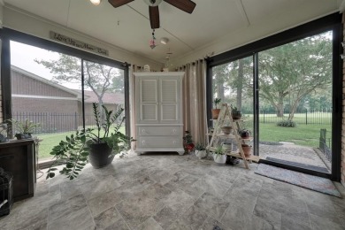 Nestled directly on the scenic Golf Course in Hideaway, this on Hide-A-Way Lake Golf Course in Texas - for sale on GolfHomes.com, golf home, golf lot